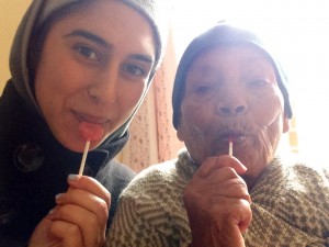 Yasmin and her Nepali grandma eating lollipops (the grandmother’s first time)